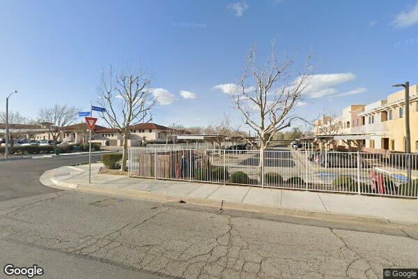 Photo of WHISPERING PALMS APTS